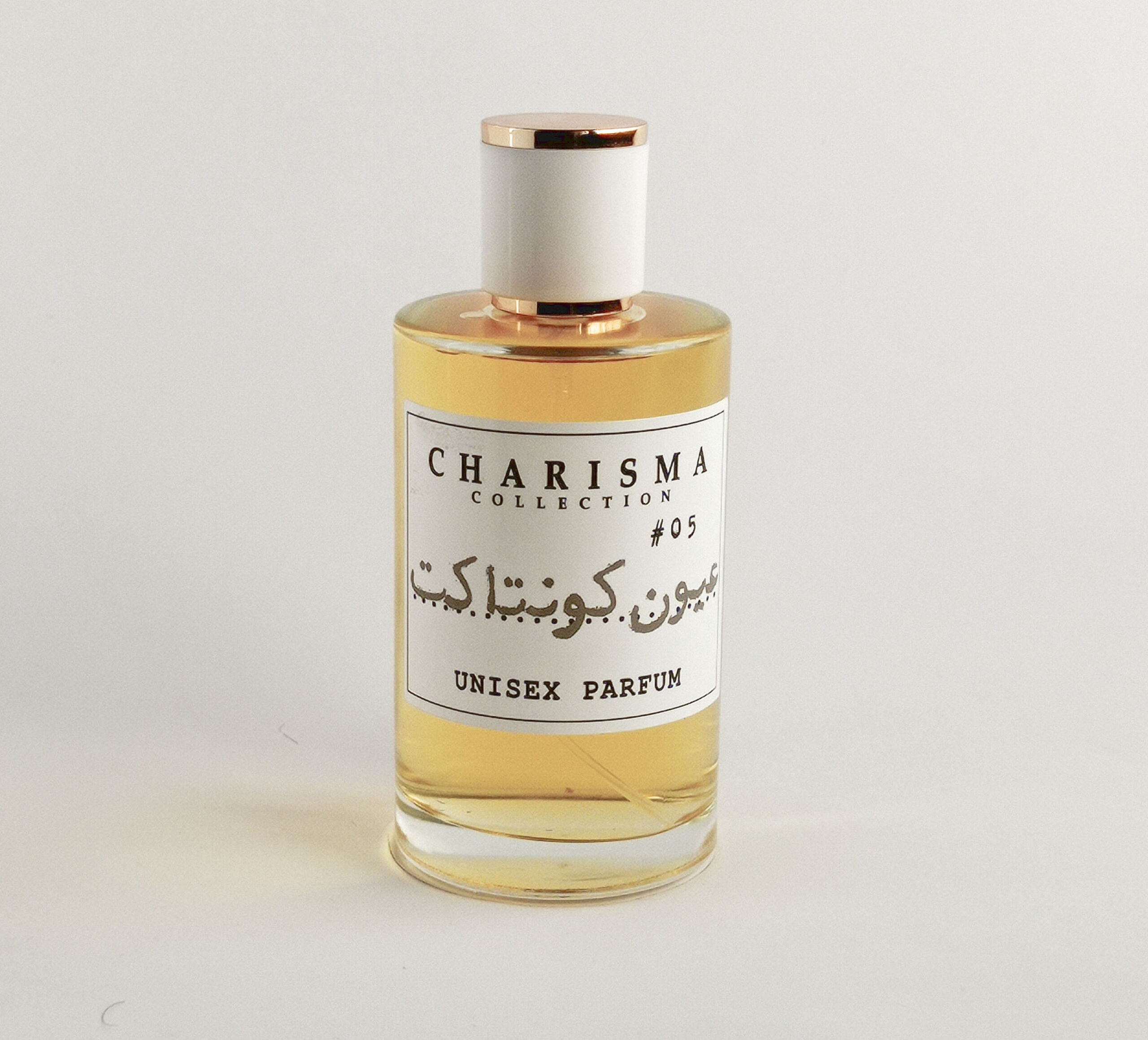 Ouyon Contact Perfume عطر عيون كونتاكت Charisma Collection Ouyon Contact perfume 50 ml bottle luxury unisex fragrance with clean minimalist aesthetic