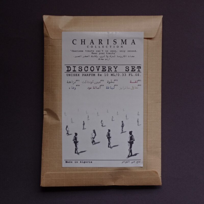 “Charisma Collection Discovery Set – Unisex perfumes made in Algeria, featuring 8×10ml bottles with artistic packaging and Arabic-English design highlighting individuality and charisma traits.”